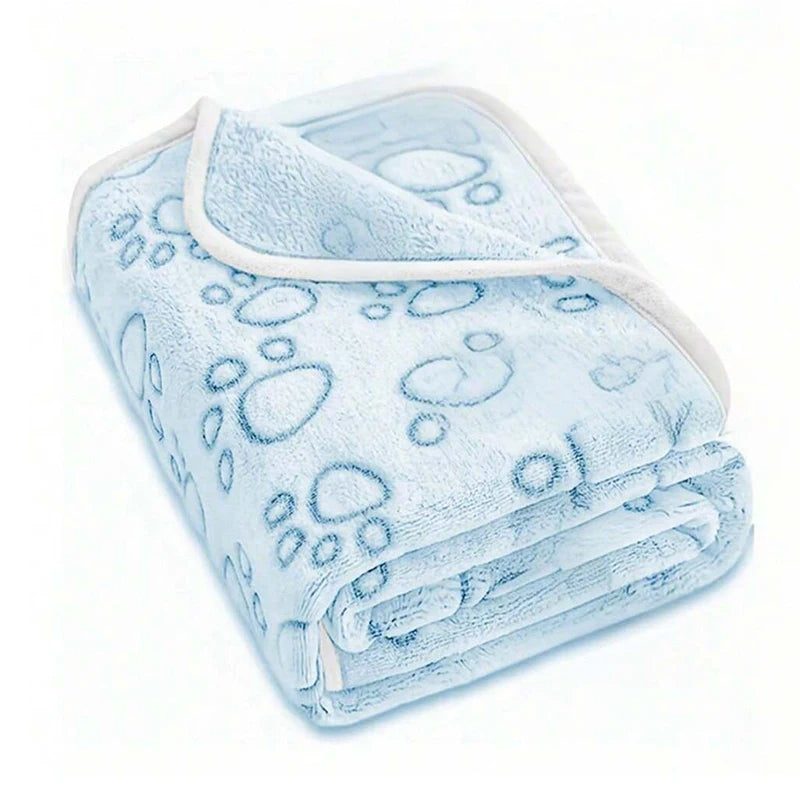 Coperta morbida per cani e gatti in flanella grigia, rosa e ciano con disegni di impronte, disponibile in tre misure, ideale per proteggere il divano.