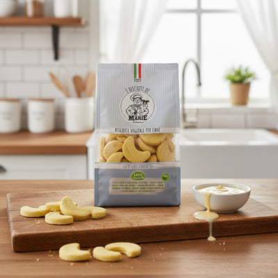 Confezione da 400g di Biscotti Marie Vegetali per cani a forma di mezzaluna, aromatizzati al formaggio, snack leggero senza carne, sale, zuccheri e lieviti.