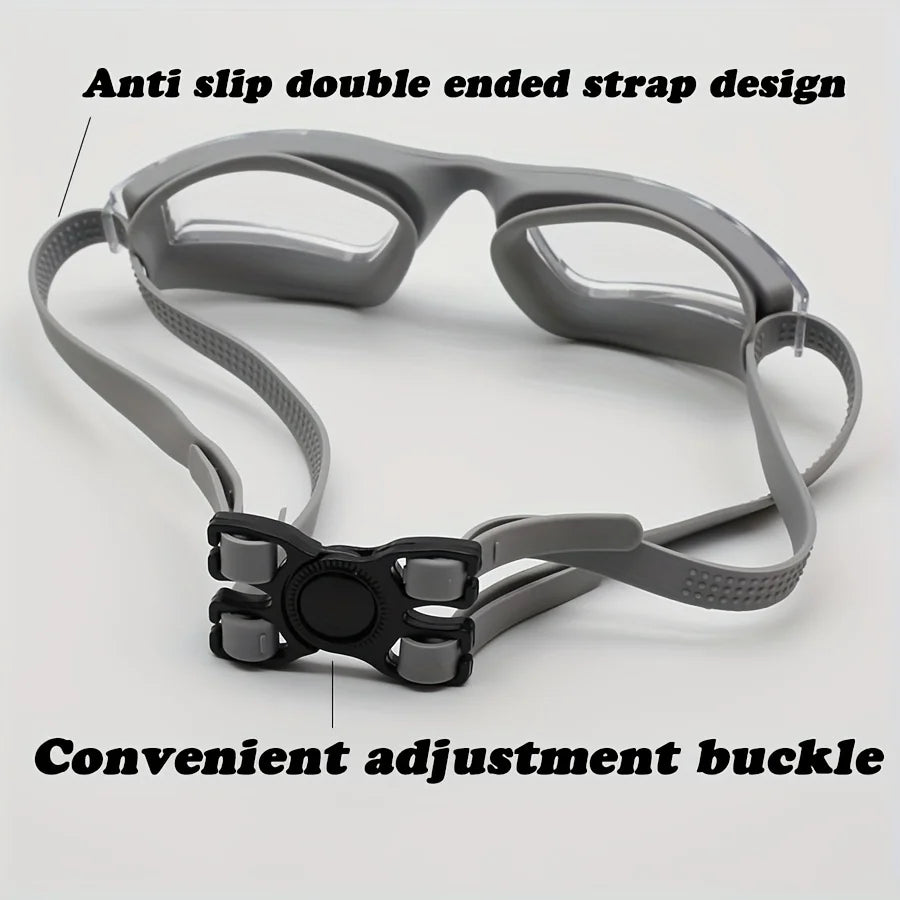 Occhialini nuoto professionali G2427 con lenti azzurre specchiate e montatura nera, design Large Frame per visione 180 gradi, kit con tappi e stringinaso.
