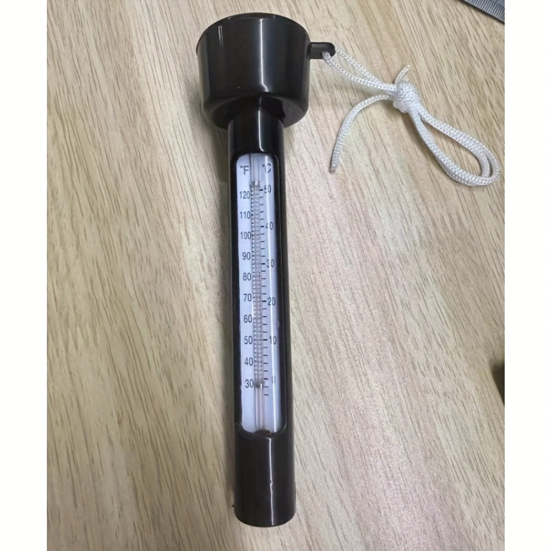 Termometro galleggiante bianco per piscina in plastica con doppia scala Celsius e Fahrenheit, include cavo di fissaggio per bordo piscina.
